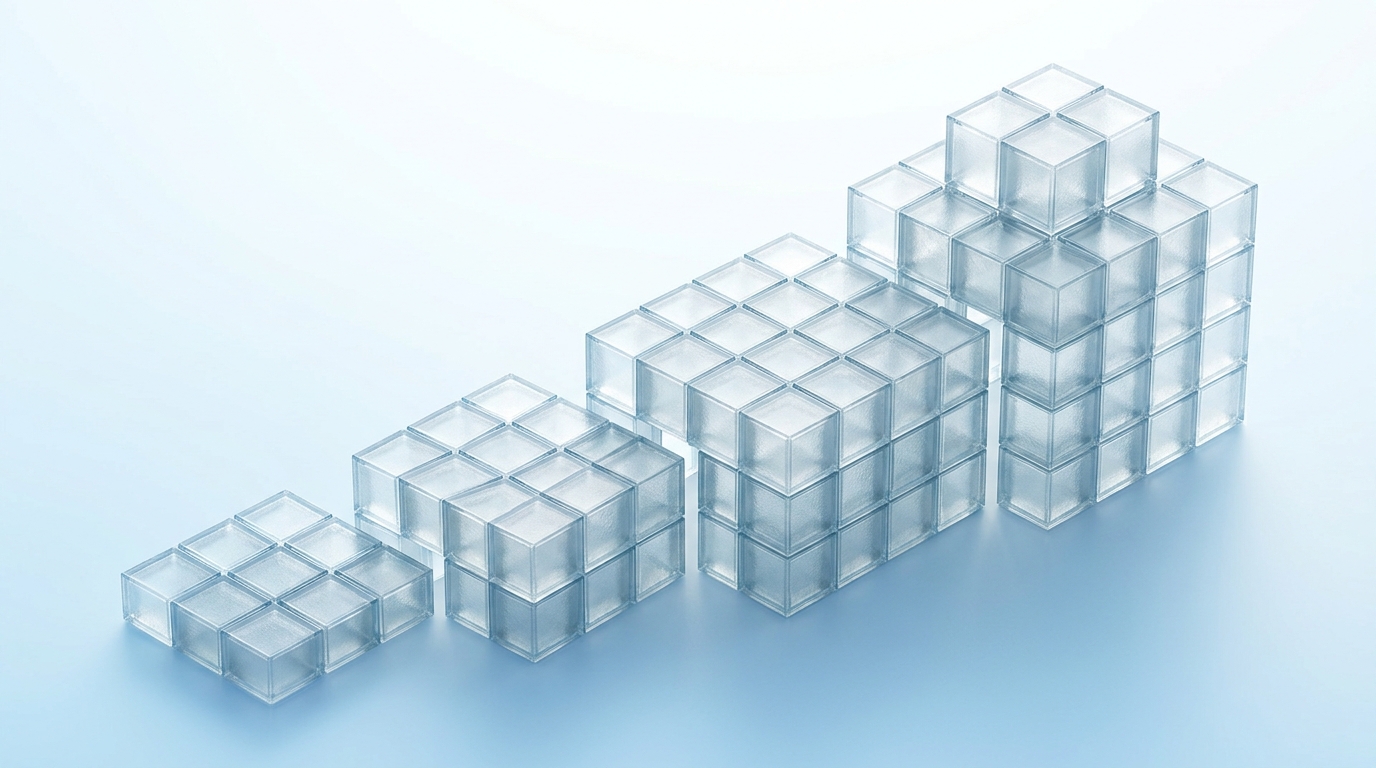 A birds-eye view of four clearly distinct stacked tiers of frosted glass blocks rising in height like pricing steps, set